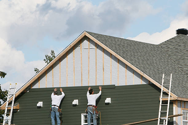 Professional Siding technician working in Syria, VA
